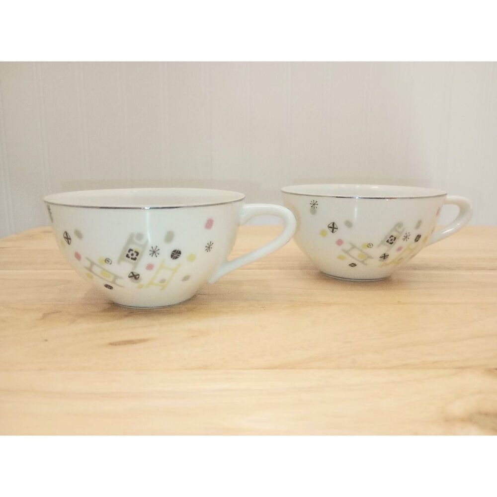 Two vintage MCM Laurel China tea cups " Frolic"
